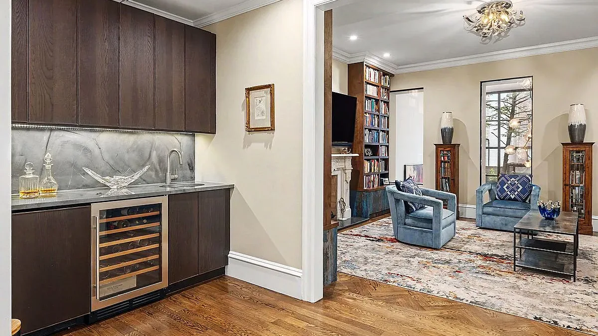 Built-in Sub-Zero wine cooler in a Paradise Valley estate lounge, ready for a certified wine storage repair visit
